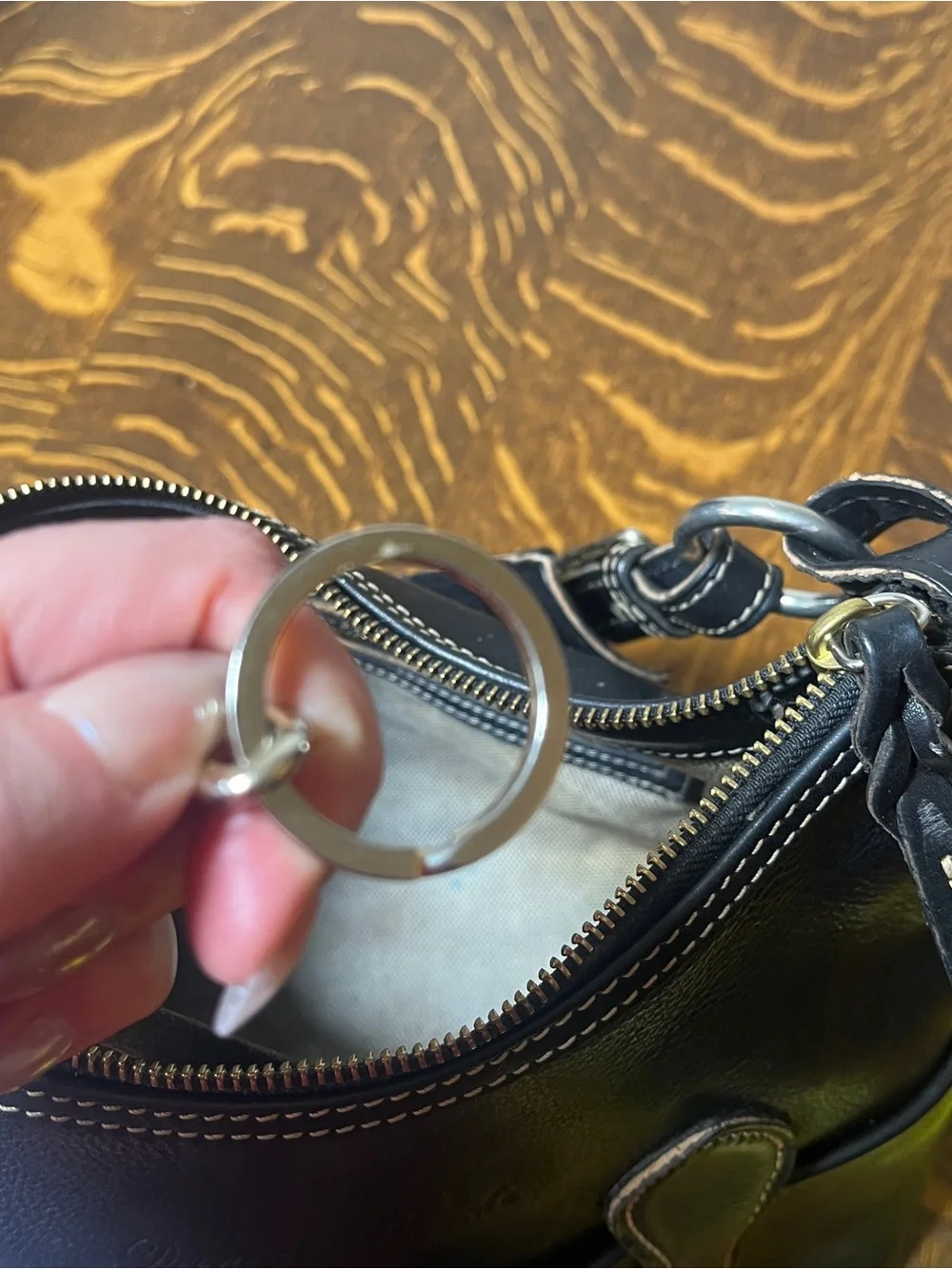 Dooney & Bourke Black Leather Hobo Shoulder Bag with Contrast Stitching